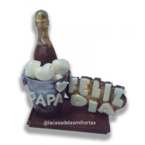 botella de champagne en balde de chocolate