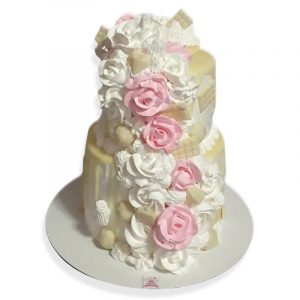 Torta drip rosas de crema y chocolate blanco